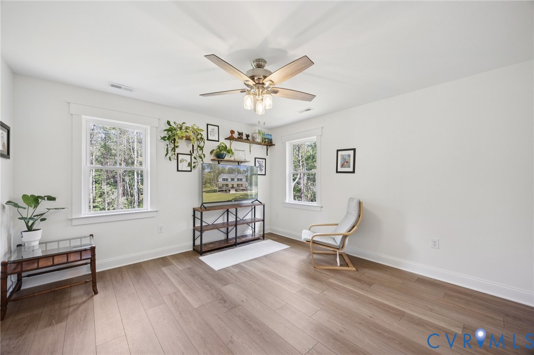 15290 Dunn Road Montpelier, VA 23192 - Photo 14 of 32 Living area featuring light wood-style flooring an