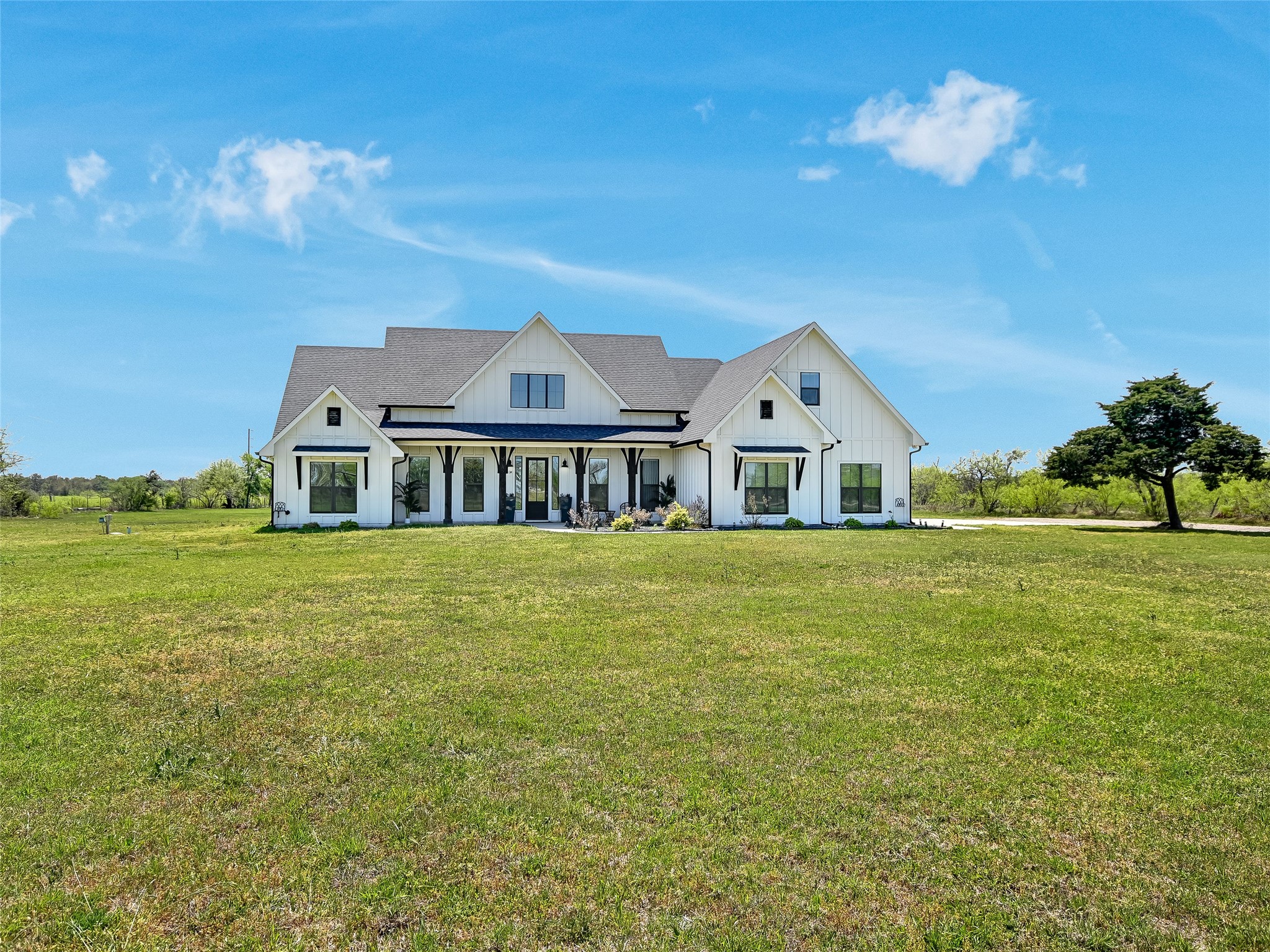 19819 Lockwood Road Manor, TX 78653 - Photo 3 of 29 Classic farmhouse charm on five serene acres—your private escape with endless possibilities.