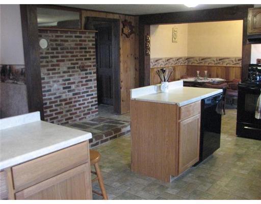 197 Neck Road Waterville, ME 04901 - Photo 5 of 13 Kitchen. Take notice the brick and slate
