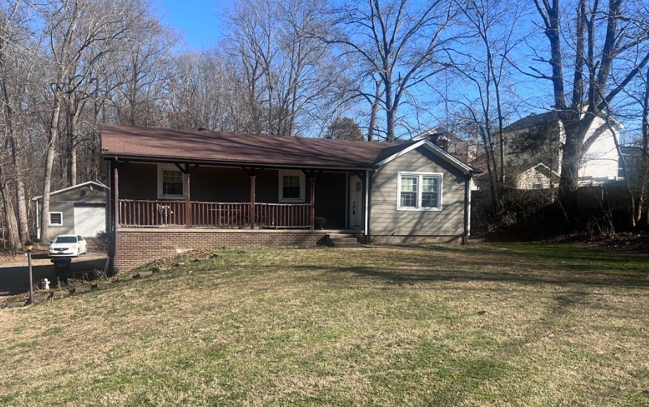 2189 Whitfield Road Clarksville, TN 37040 - Photo 1 of 24 a front view of a house with a yard