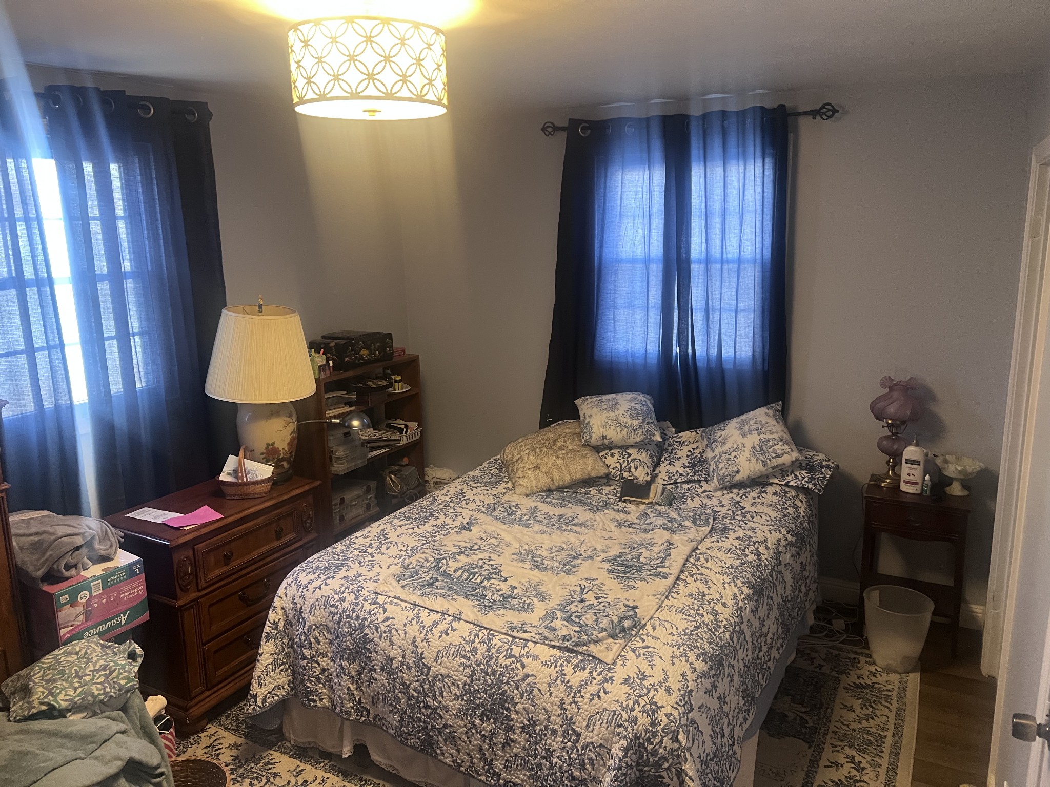 2189 Whitfield Road Clarksville, TN 37040 - Photo 12 of 24 a bedroom with a bed and a lamp on dresser