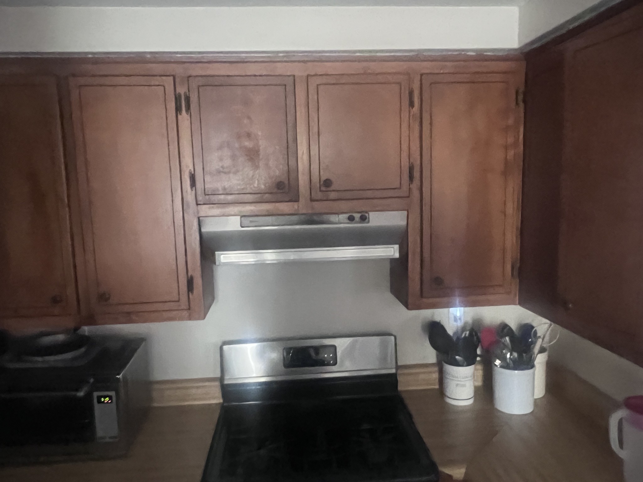 2189 Whitfield Road Clarksville, TN 37040 - Photo 6 of 24 a kitchen with a refrigerator and a sink