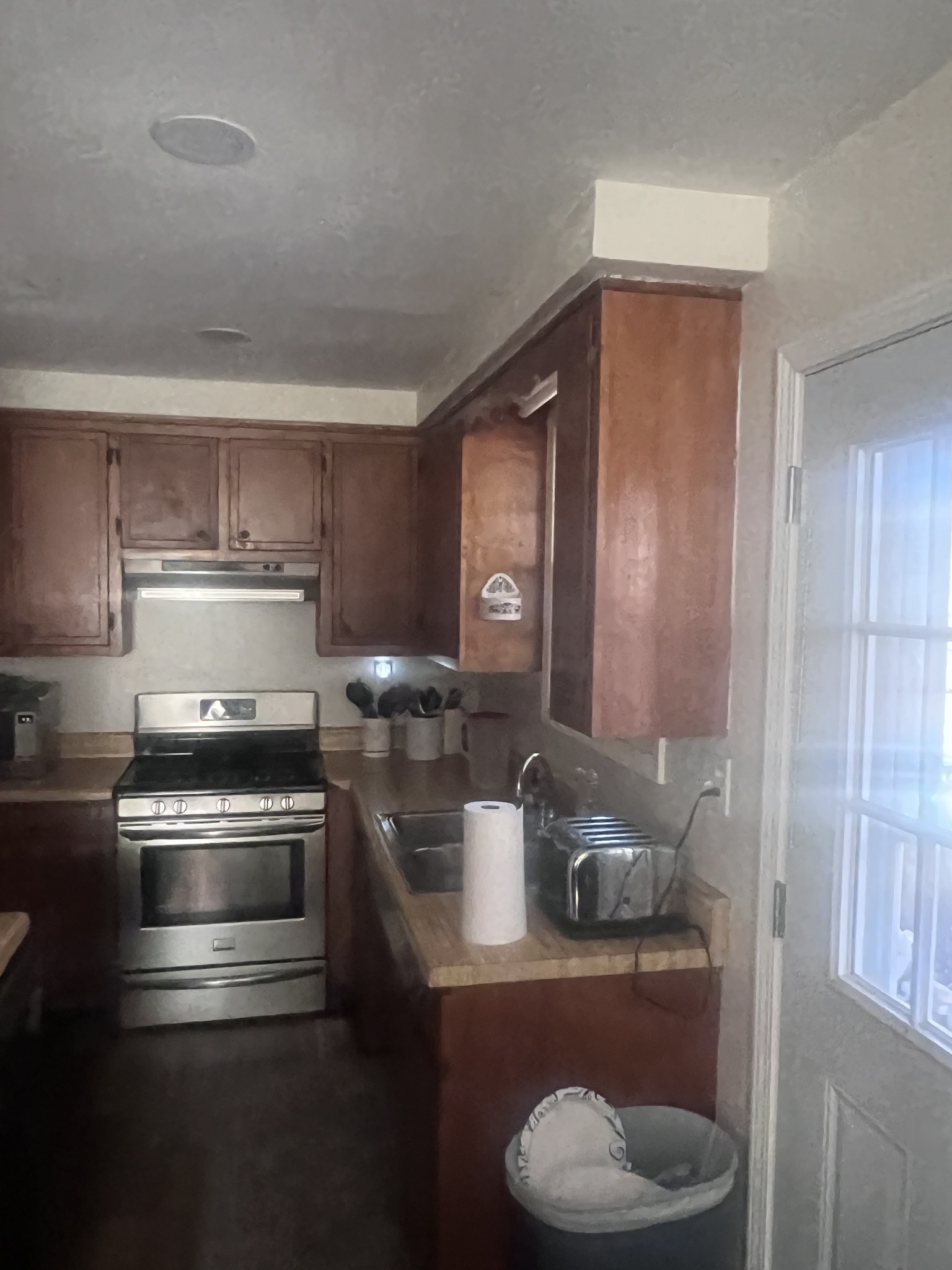 2189 Whitfield Road Clarksville, TN 37040 - Photo 7 of 24 a kitchen with a stove and a microwave