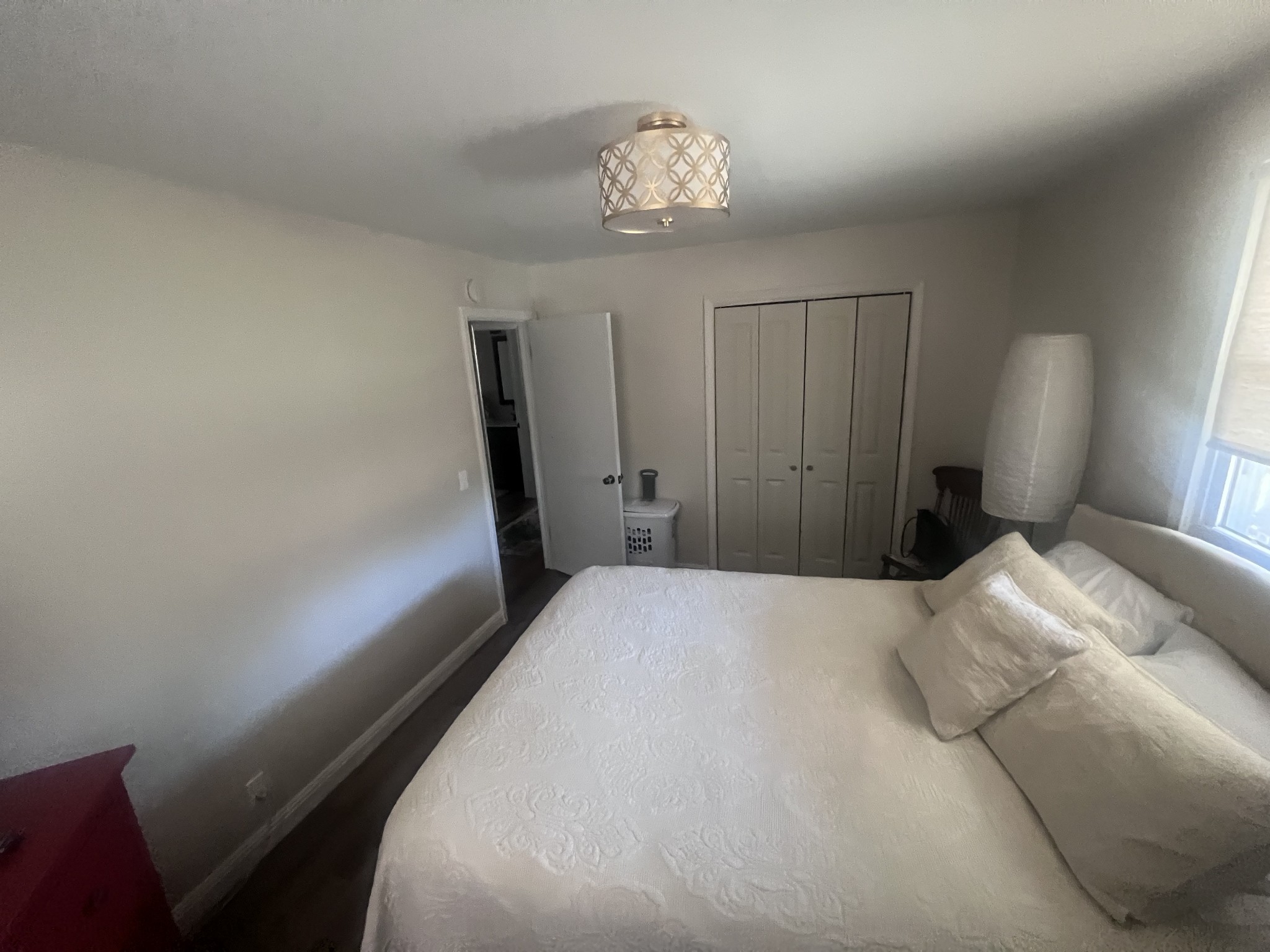 2189 Whitfield Road Clarksville, TN 37040 - Photo 10 of 24 a bedroom with a bed and a chandelier