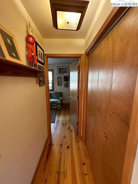 495 Rocky Top Lane Independence, VA 24348 - Photo 34 of 39 a view of a hallway with wooden floor and staircase