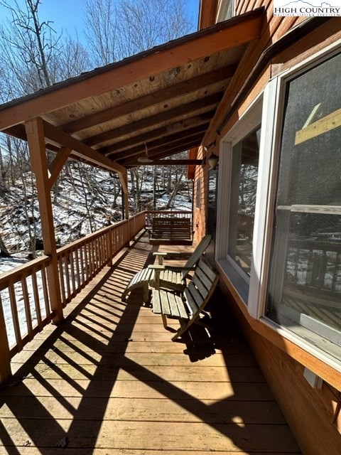 495 Rocky Top Lane Independence, VA 24348 - Photo 7 of 39 a view of balcony with wooden floor