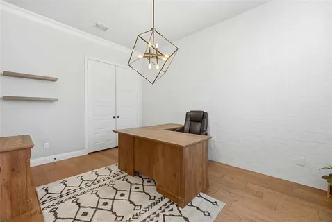 a view of entryway with wooden floor