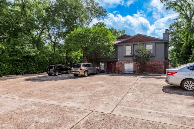 a car parked in front of a house