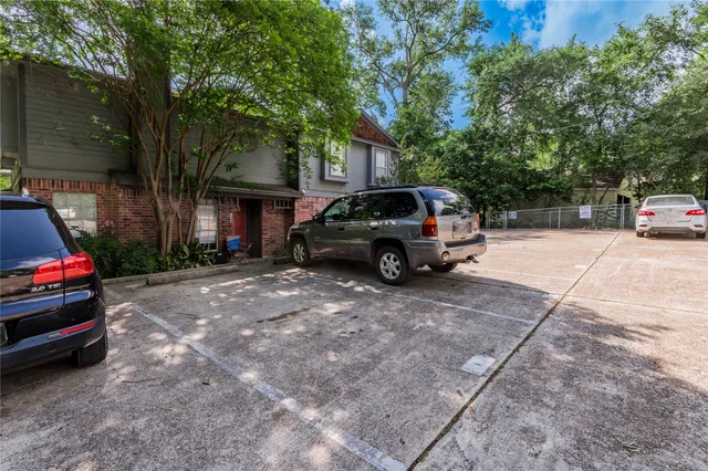 a car parked in front of a house