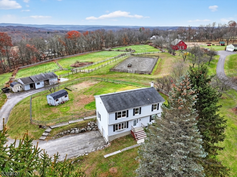 an aerial view of a house with garden space