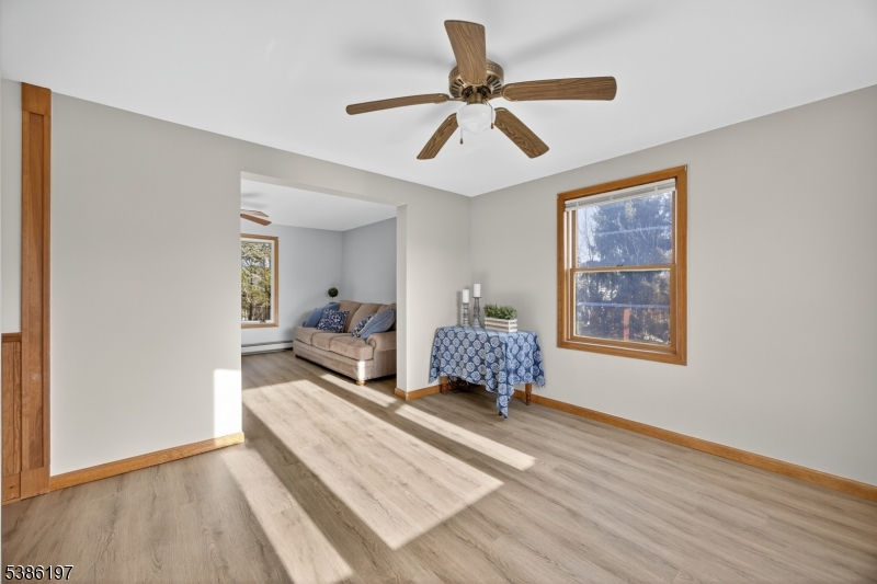 61 Coykendall Road Wantage, NJ 07461 - Photo 11 of 43 a living room with a bed furniture and a window
