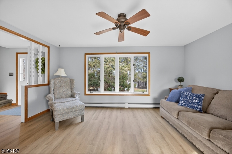 61 Coykendall Road Wantage, NJ 07461 - Photo 12 of 43 a living room with furniture and a large window