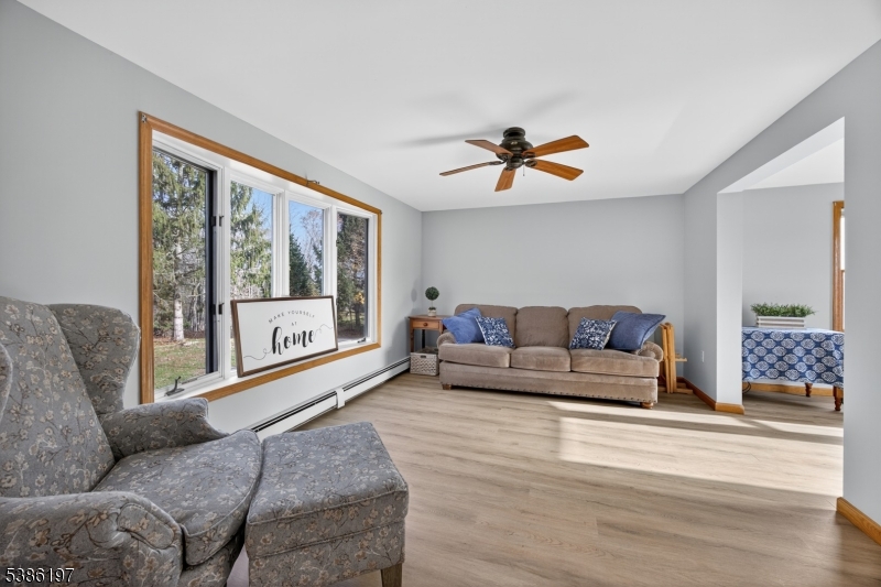 61 Coykendall Road Wantage, NJ 07461 - Photo 14 of 43 a living room with furniture and a large window