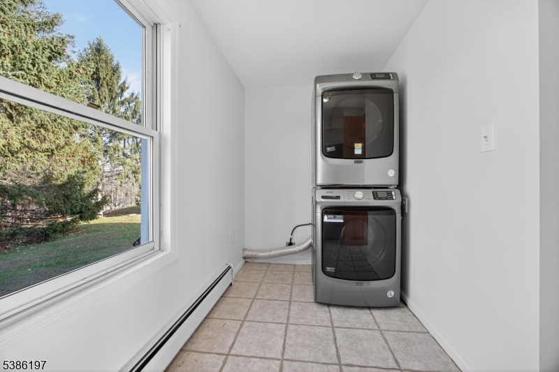 61 Coykendall Road Wantage, NJ 07461 - Photo 17 of 43 a view of a hallway with washer and dryer
