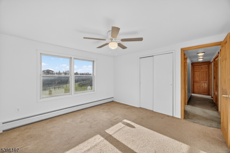 61 Coykendall Road Wantage, NJ 07461 - Photo 22 of 43 a view of an empty room with a window