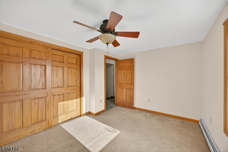 61 Coykendall Road Wantage, NJ 07461 - Photo 25 of 43 an empty room with closet and windows
