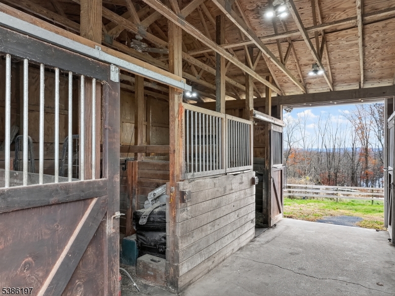 61 Coykendall Road Wantage, NJ 07461 - Photo 31 of 43 a view of a porch with wooden floor next to a yard