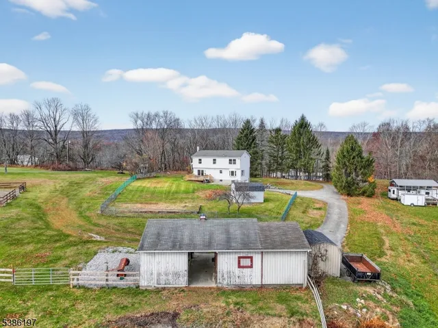 a view of a house with a swimming pool