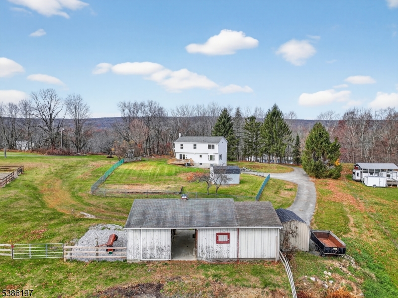 61 Coykendall Road Wantage, NJ 07461 - Photo 36 of 43 a view of a house with a swimming pool