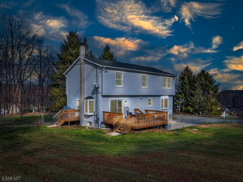 61 Coykendall Road Wantage, NJ 07461 - Photo 42 of 43 a front view of house with yard and green space