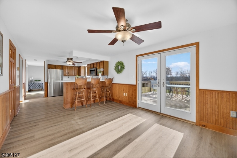 61 Coykendall Road Wantage, NJ 07461 - Photo 7 of 43 a view of a dining room with furniture window and wooden floor