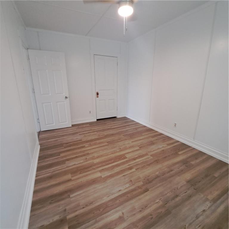 439 Longfellow Street Vandergrift, PA 15690 - Photo 28 of 49 a view of empty room with wooden floor