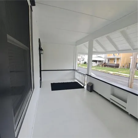 a view of an empty room with window