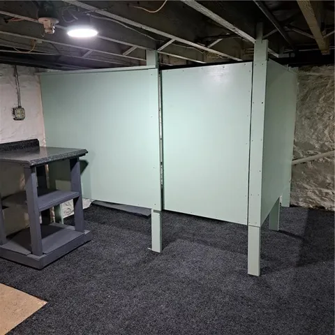 a bathroom with a toilet and a sink