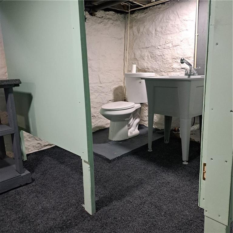 439 Longfellow Street Vandergrift, PA 15690 - Photo 32 of 49 a bathroom with a toilet and a sink