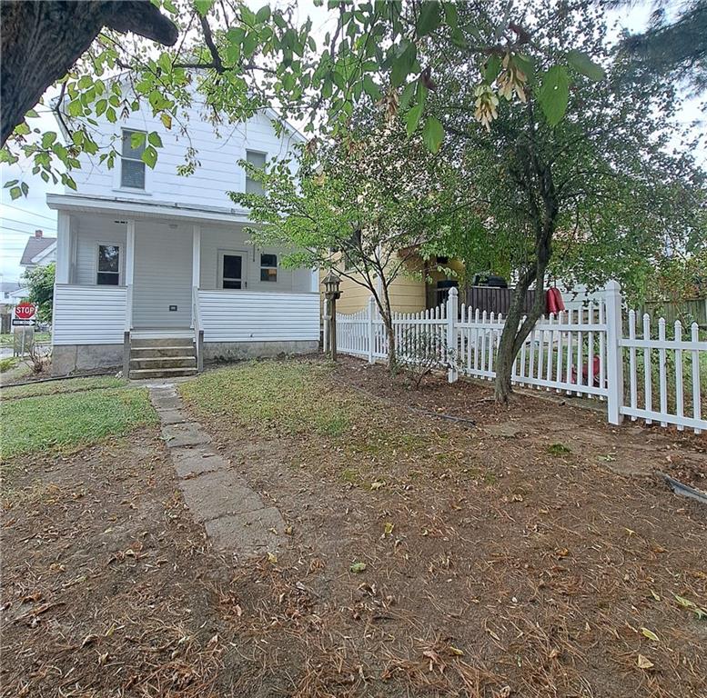 439 Longfellow Street Vandergrift, PA 15690 - Photo 44 of 49 a front view of a house with garden