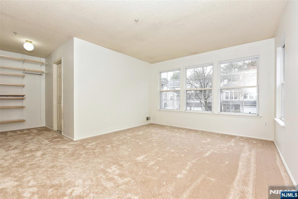 1499 Cornwall Road Mahwah, NJ 07430 - Photo 12 of 26 an empty room with windows and closet