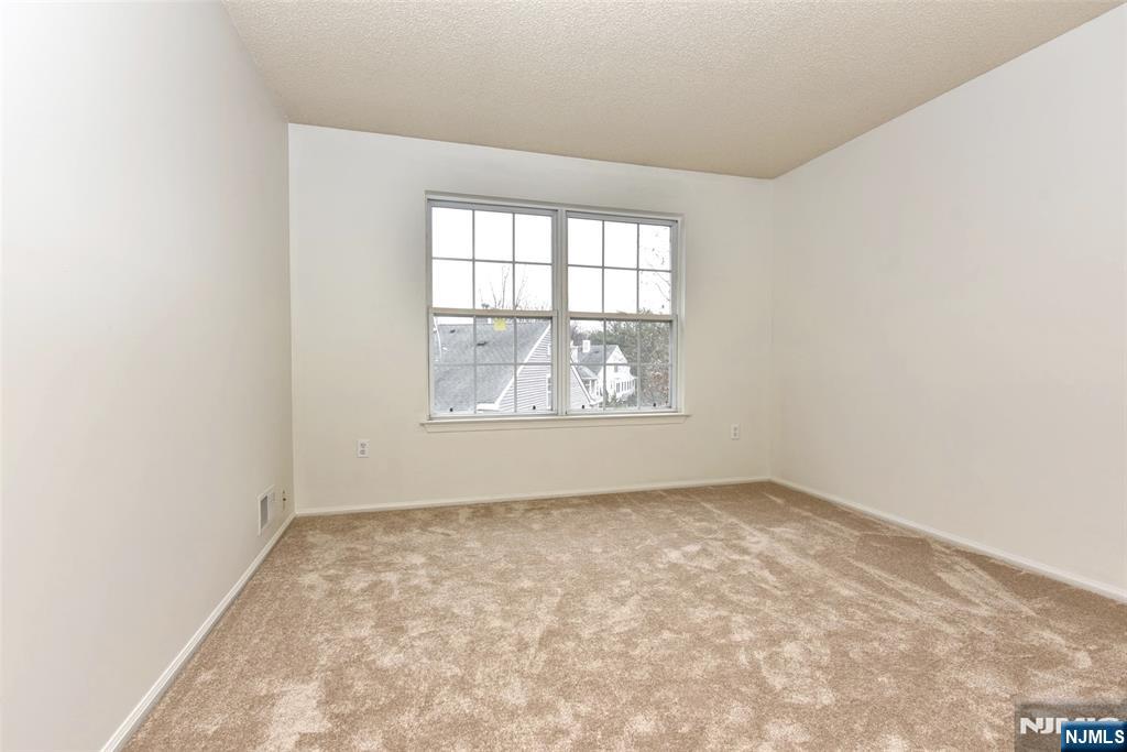 1499 Cornwall Road Mahwah, NJ 07430 - Photo 17 of 26 an empty room with a window