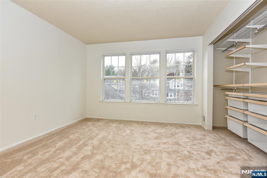 1499 Cornwall Road Mahwah, NJ 07430 - Photo 18 of 26 a view of an empty room with a window