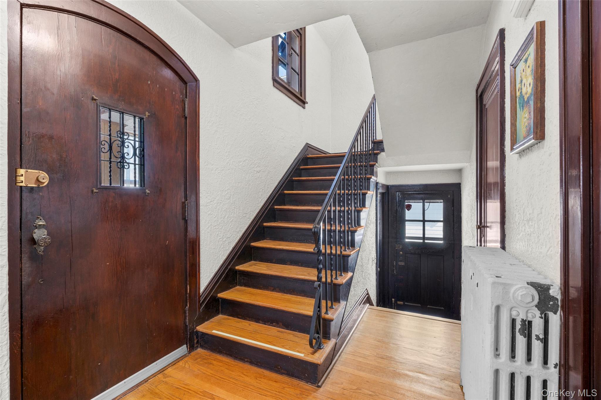 116 Reed Avenue Pelham, NY 10803 - Photo 3 of 22 a view of entryway and hall with wooden floor