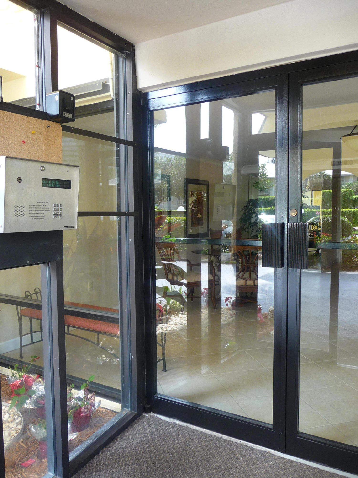 951 De Soto Road, Unit 228 Boca Raton, FL 33432 - Photo 5 of 32 PHONE ENTRY