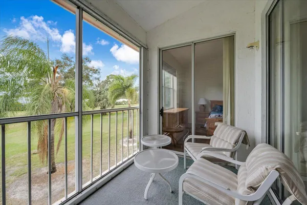a balcony with furniture
