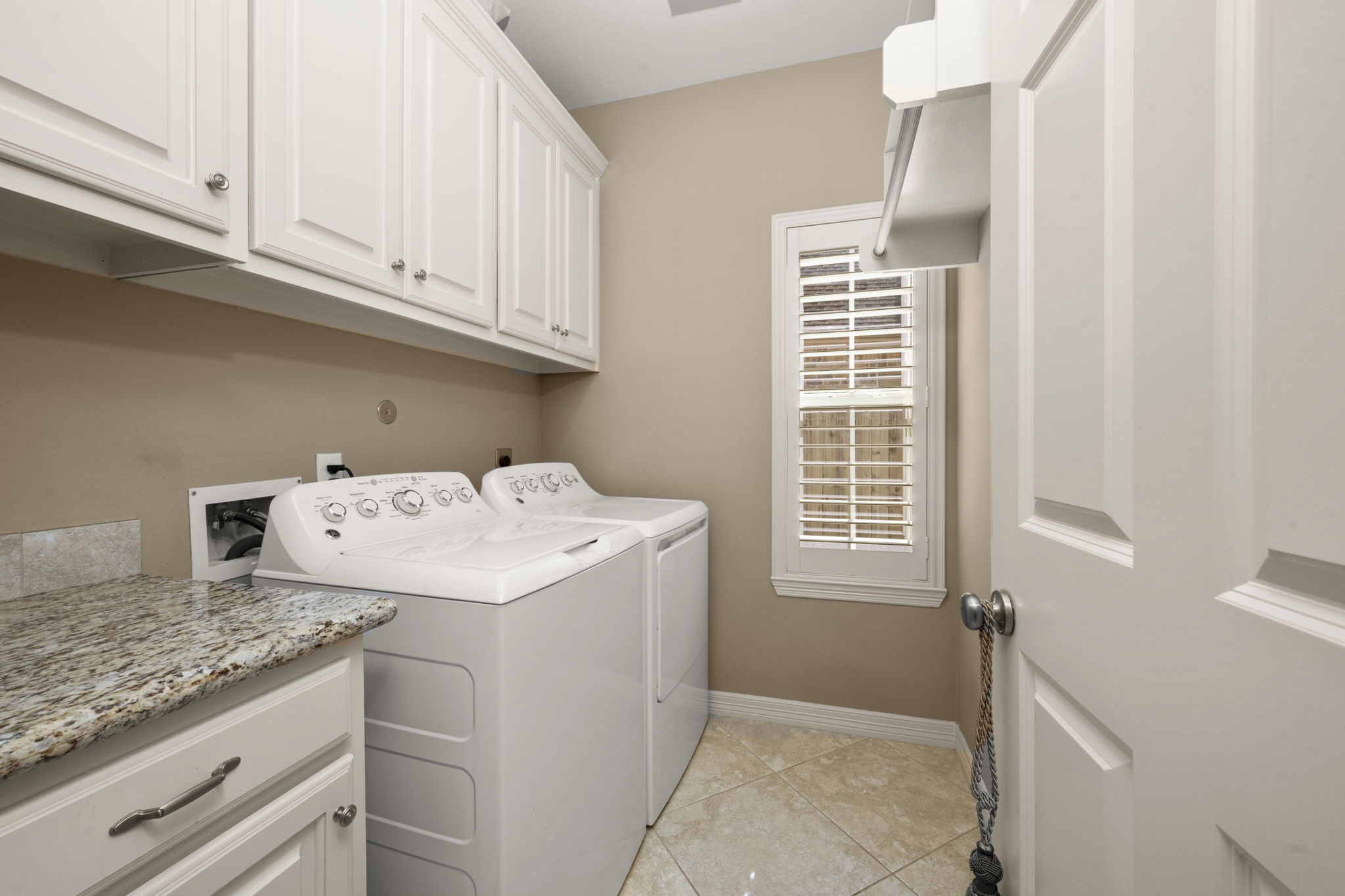 25051 Bow Wood Court Spring, TX 77389 - Photo 12 of 22 a utility room with closet dryer and washer