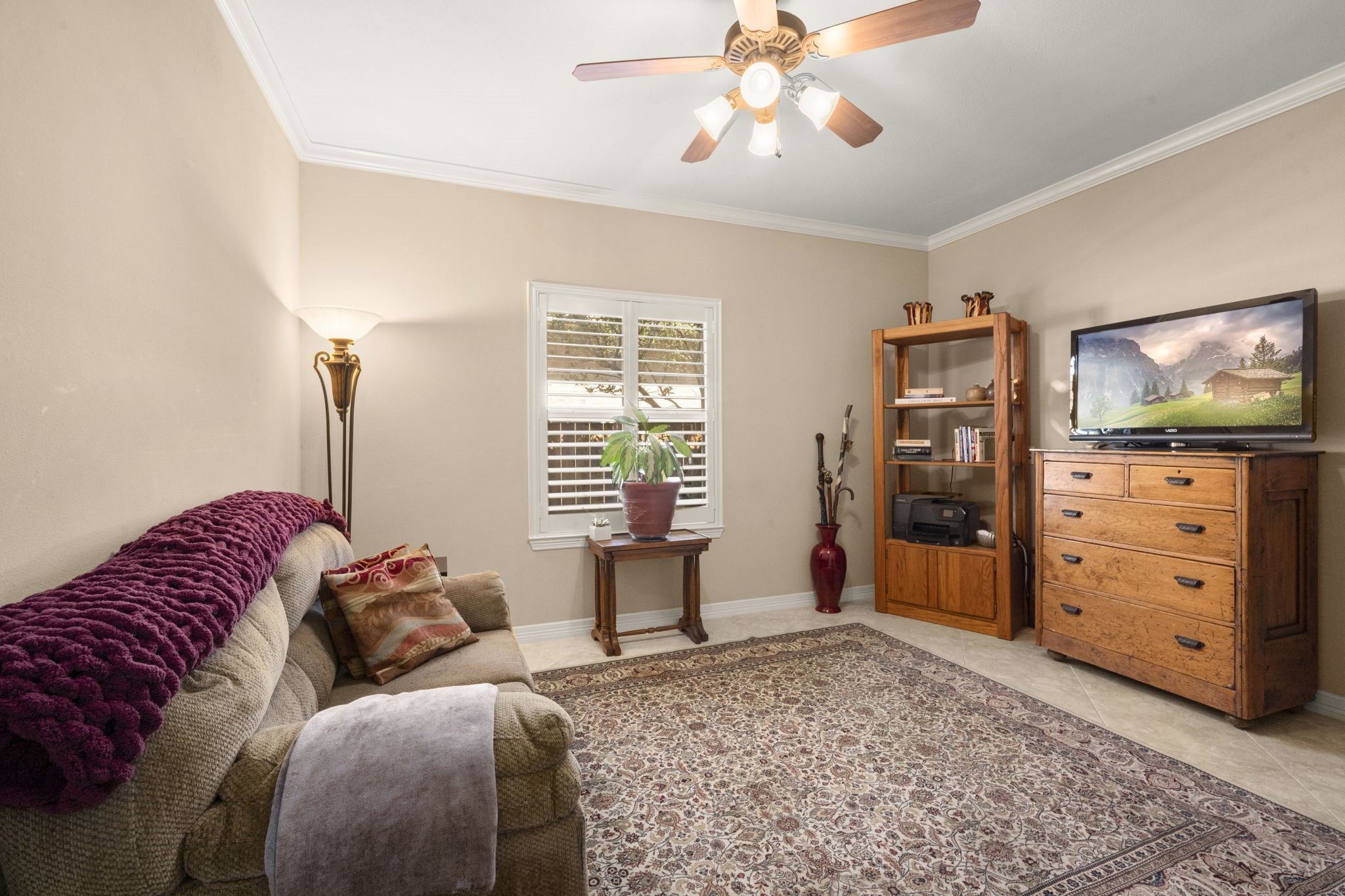 25051 Bow Wood Court Spring, TX 77389 - Photo 18 of 22 a living room with furniture and a flat screen tv