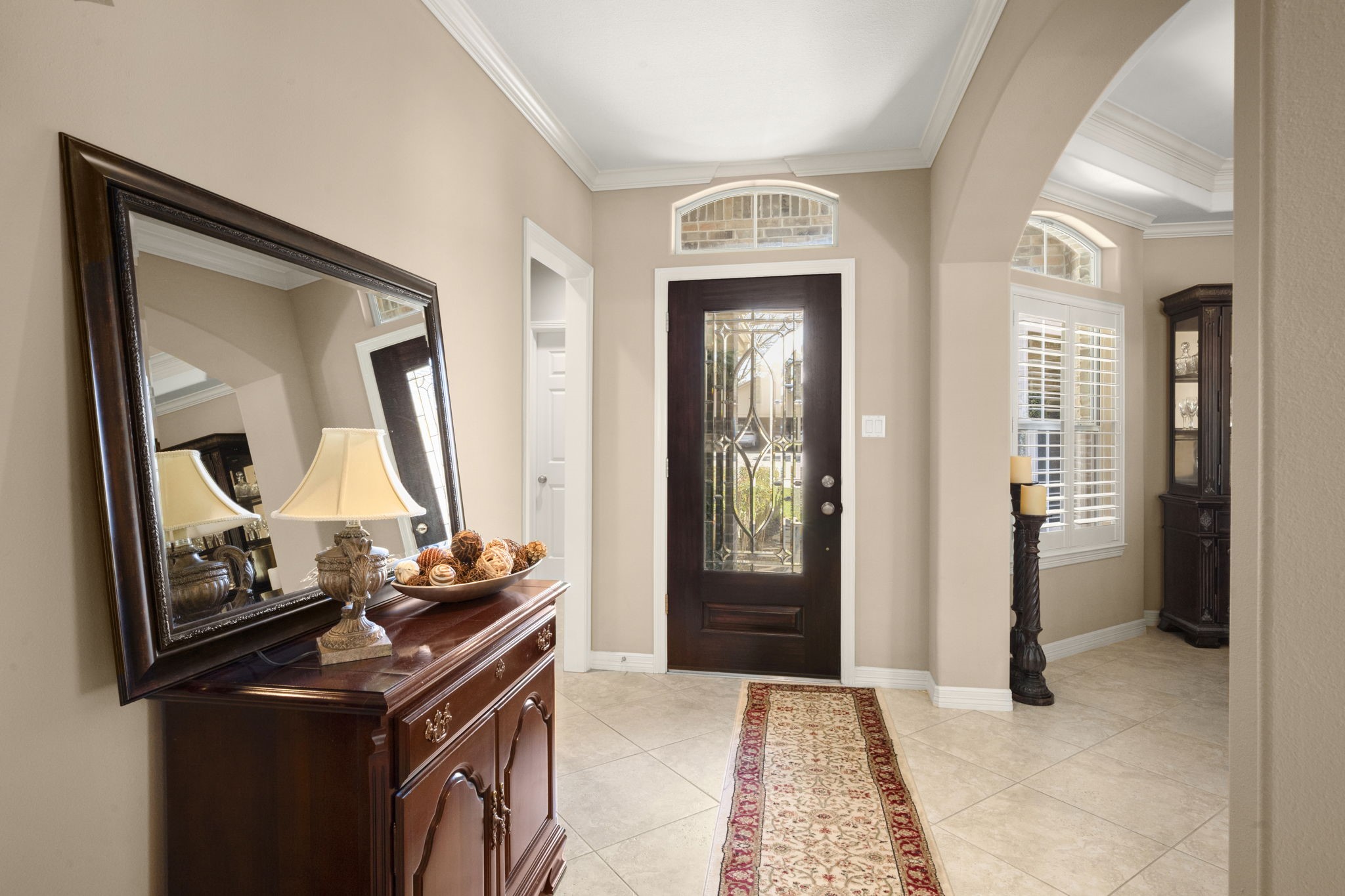 25051 Bow Wood Court Spring, TX 77389 - Photo 3 of 22 a view of a livingroom with wooden floor and a mirror