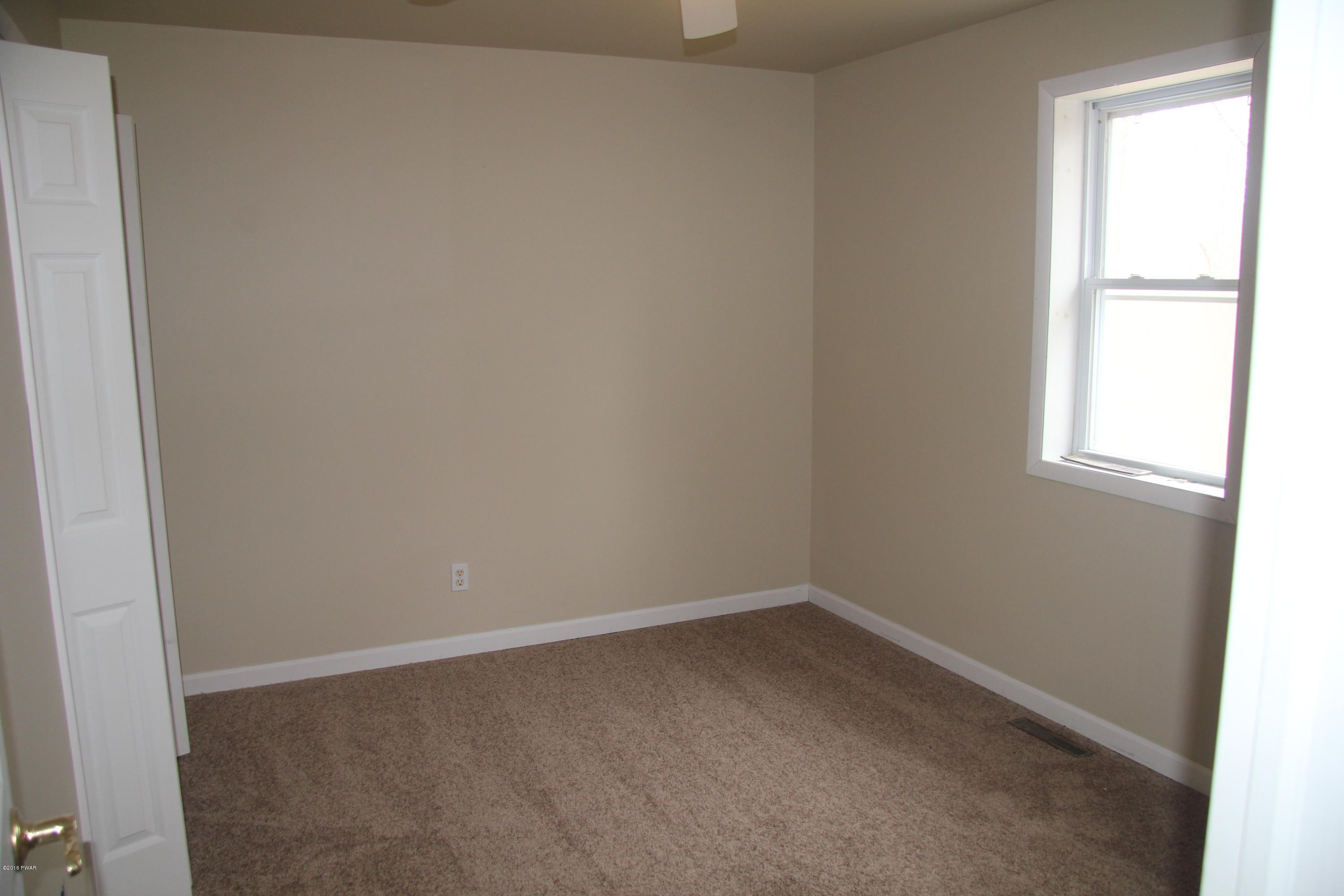 170 Swetz Road Lake Ariel, PA 18436 - Photo 9 of 16 an empty room with a window