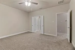 an empty room with closet area