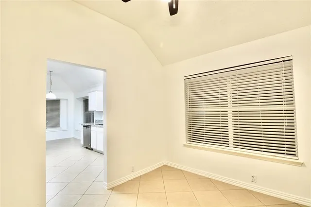 a view of a room with a window