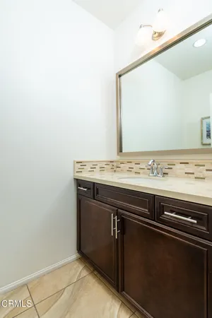 a bathroom with a bathtub and a toilet