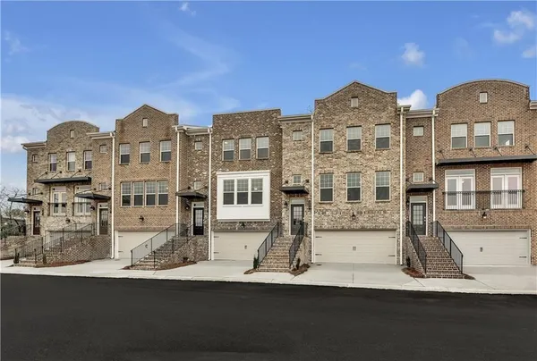a front view of a building with street view