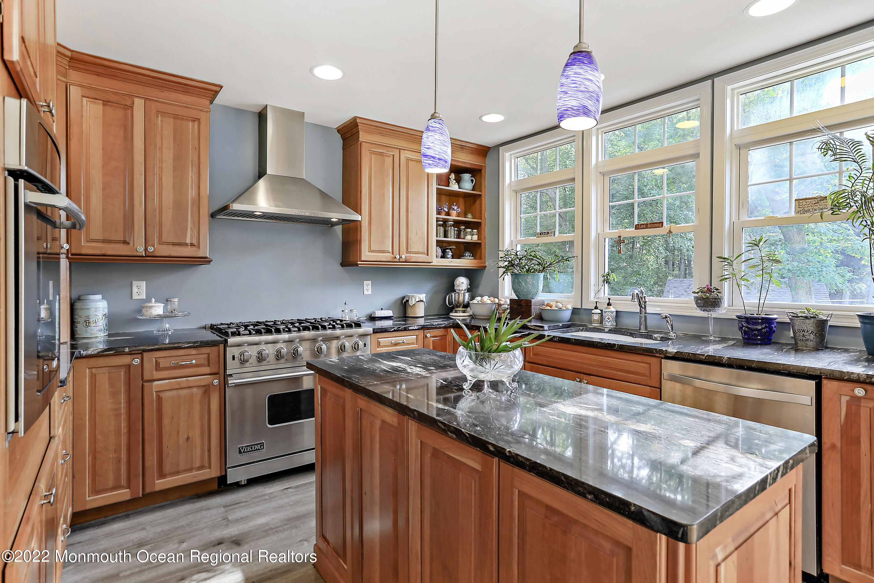 1849 Carmerville Road Wall, NJ 07719 - Photo 11 of 45 a kitchen that has a lot of cabinets in it and wooden floors