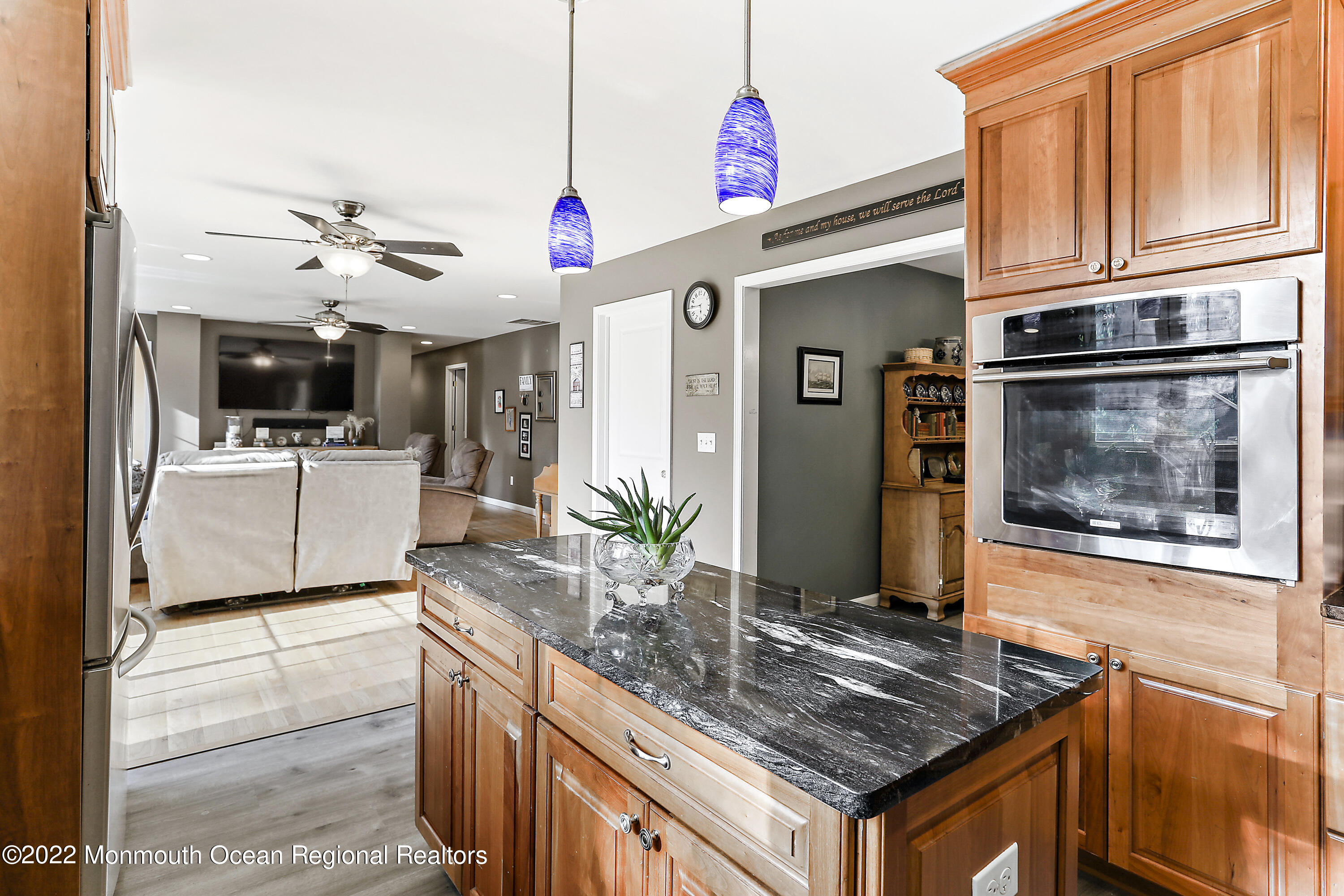 1849 Carmerville Road Wall, NJ 07719 - Photo 12 of 45 a kitchen with stainless steel appliances granite countertop a sink and a refrigerator