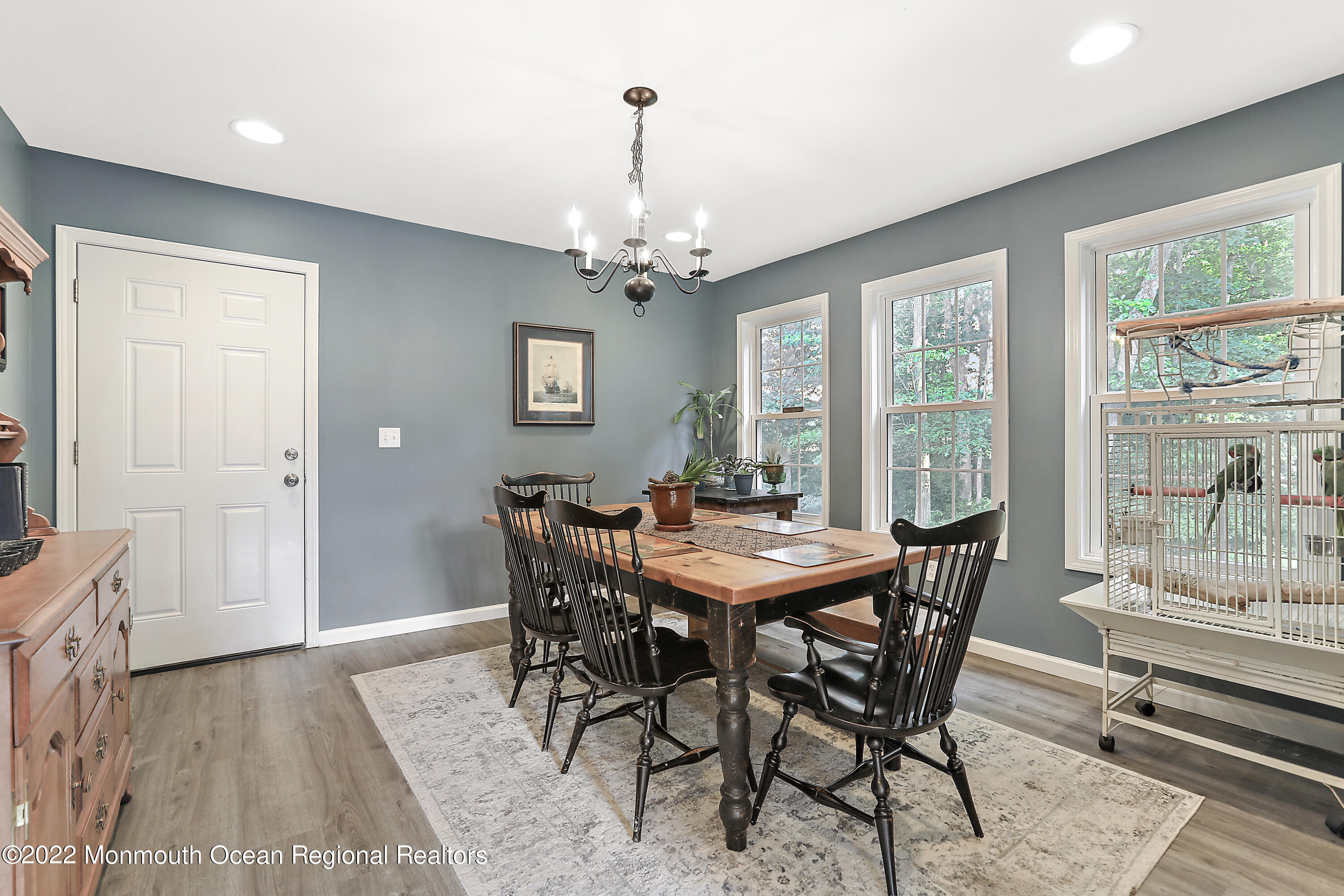 1849 Carmerville Road Wall, NJ 07719 - Photo 14 of 45 a view of a dining room with furniture window and wooden floor