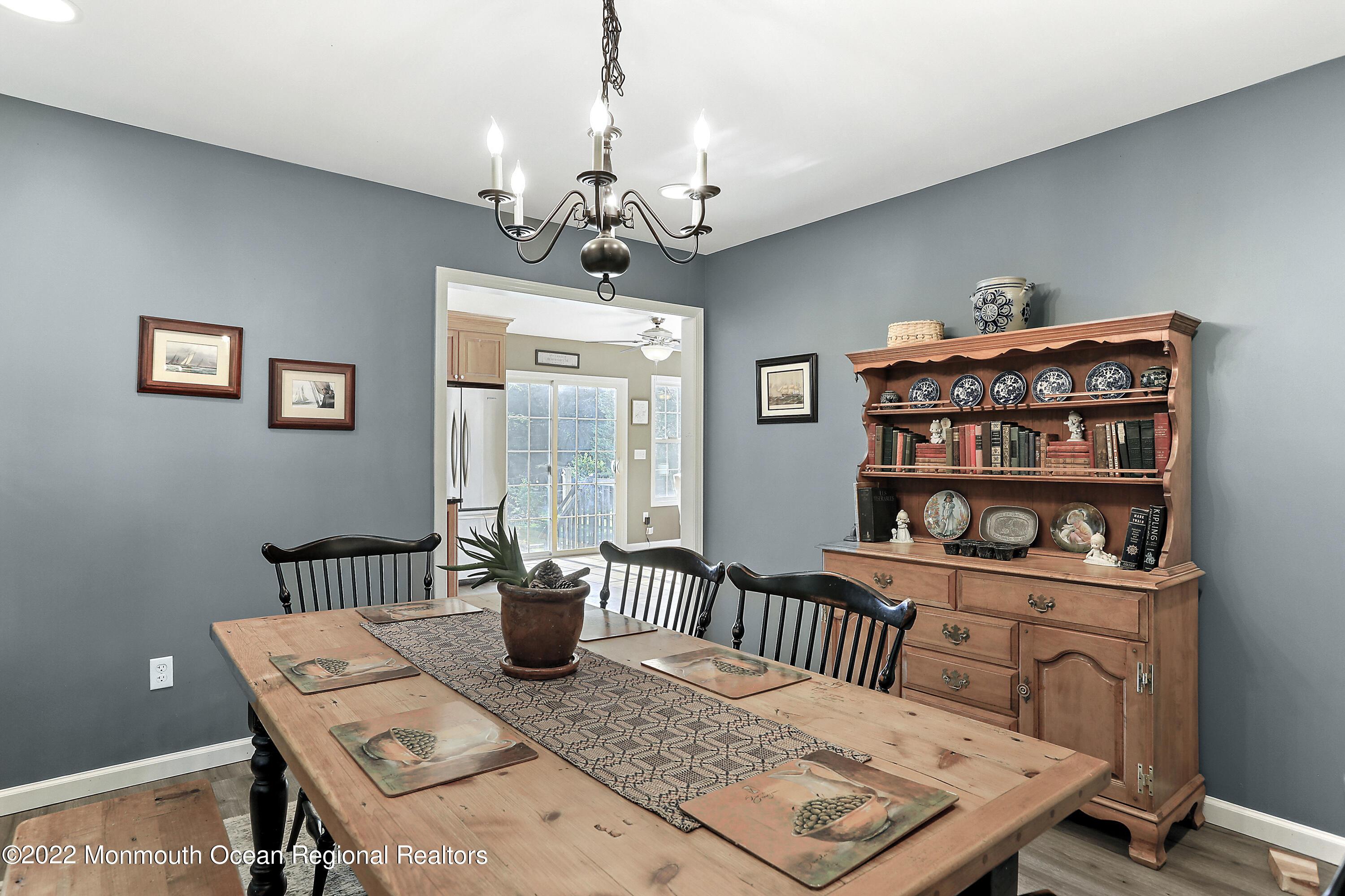1849 Carmerville Road Wall, NJ 07719 - Photo 15 of 45 a view of a dining room with furniture window and wooden floor