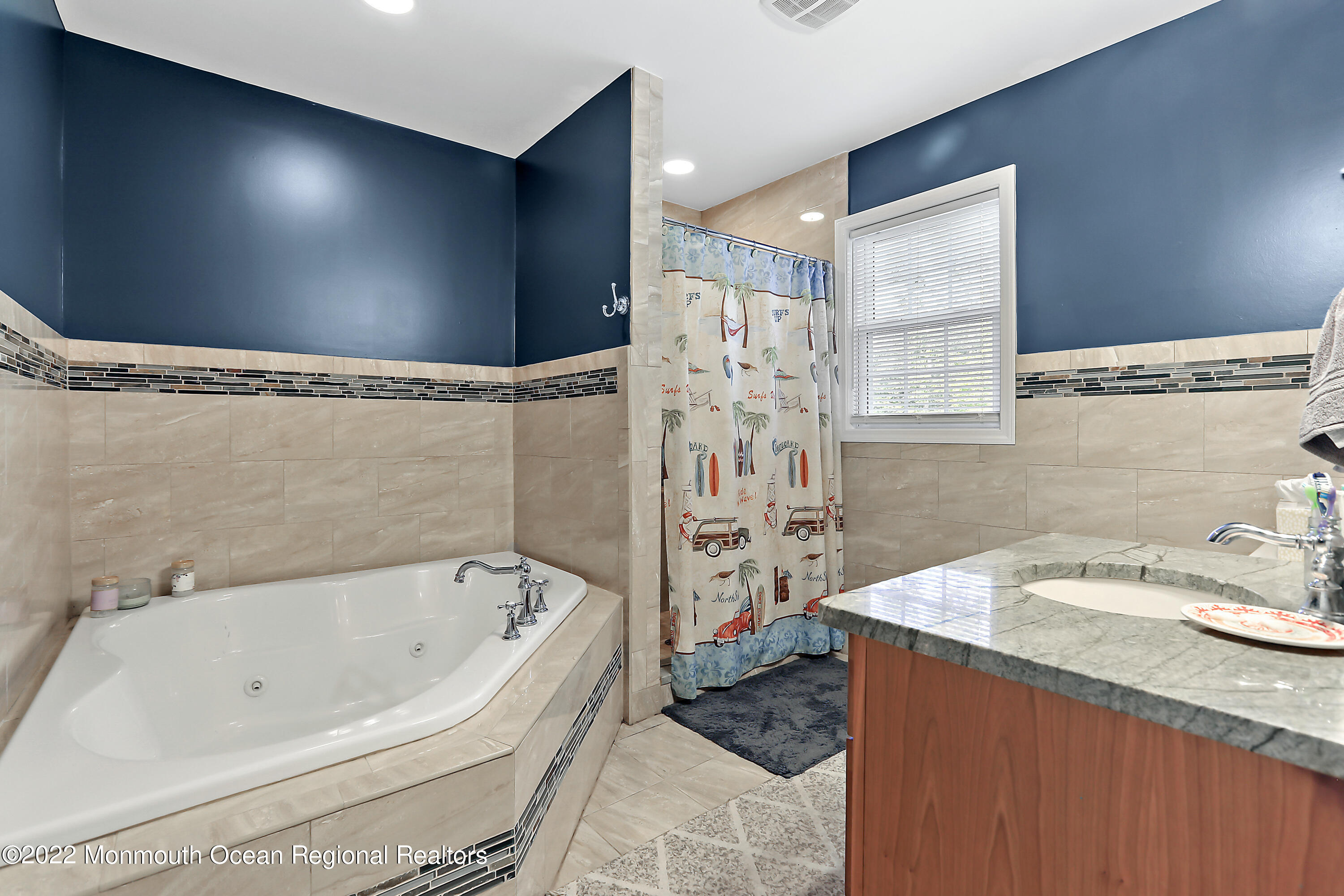 1849 Carmerville Road Wall, NJ 07719 - Photo 18 of 45 a bathroom with a bathtub and a sink