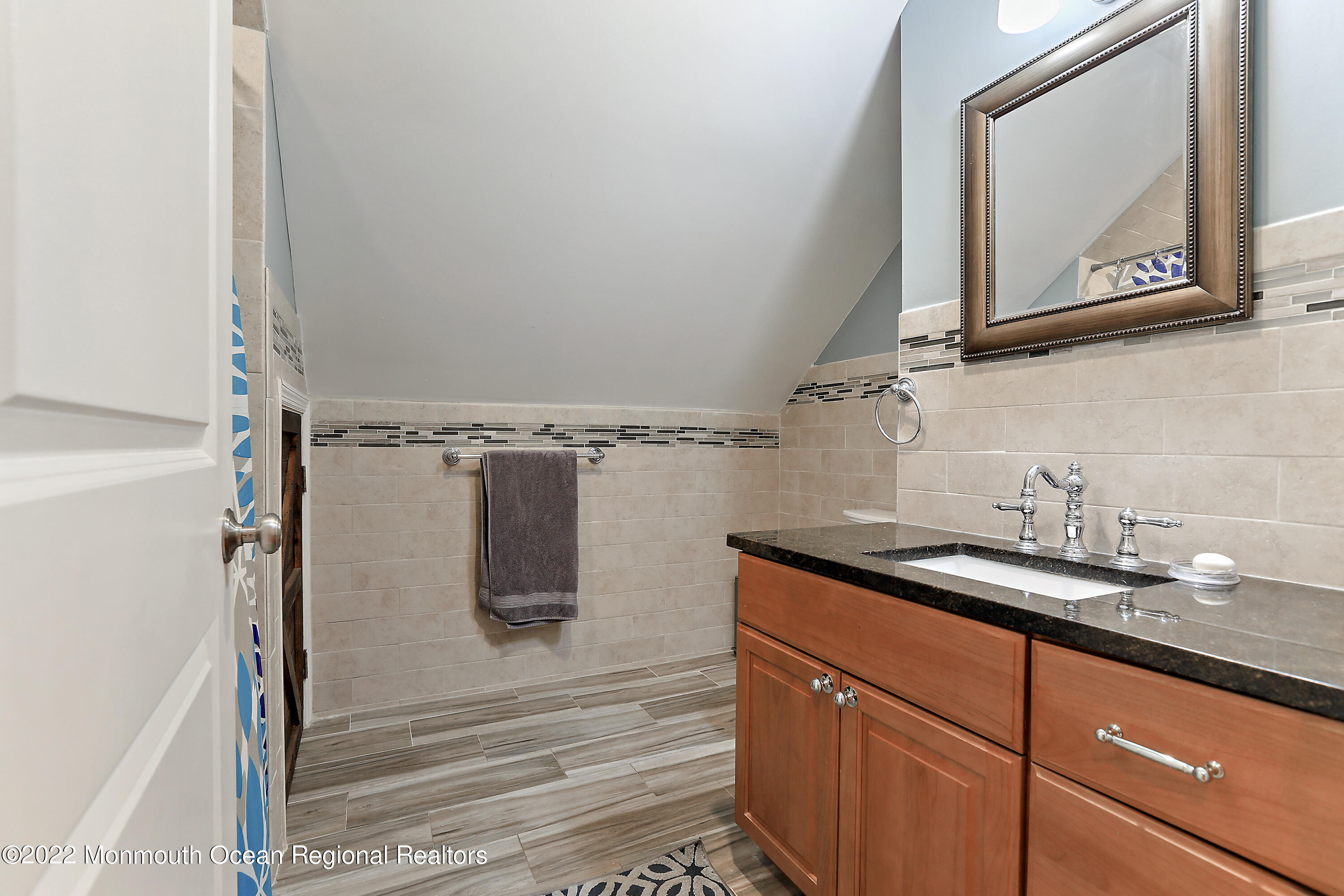 1849 Carmerville Road Wall, NJ 07719 - Photo 27 of 45 a bathroom with a granite countertop sink and a mirror